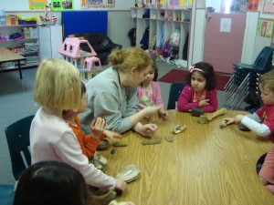 Riverbend Montessori staff playing with kids